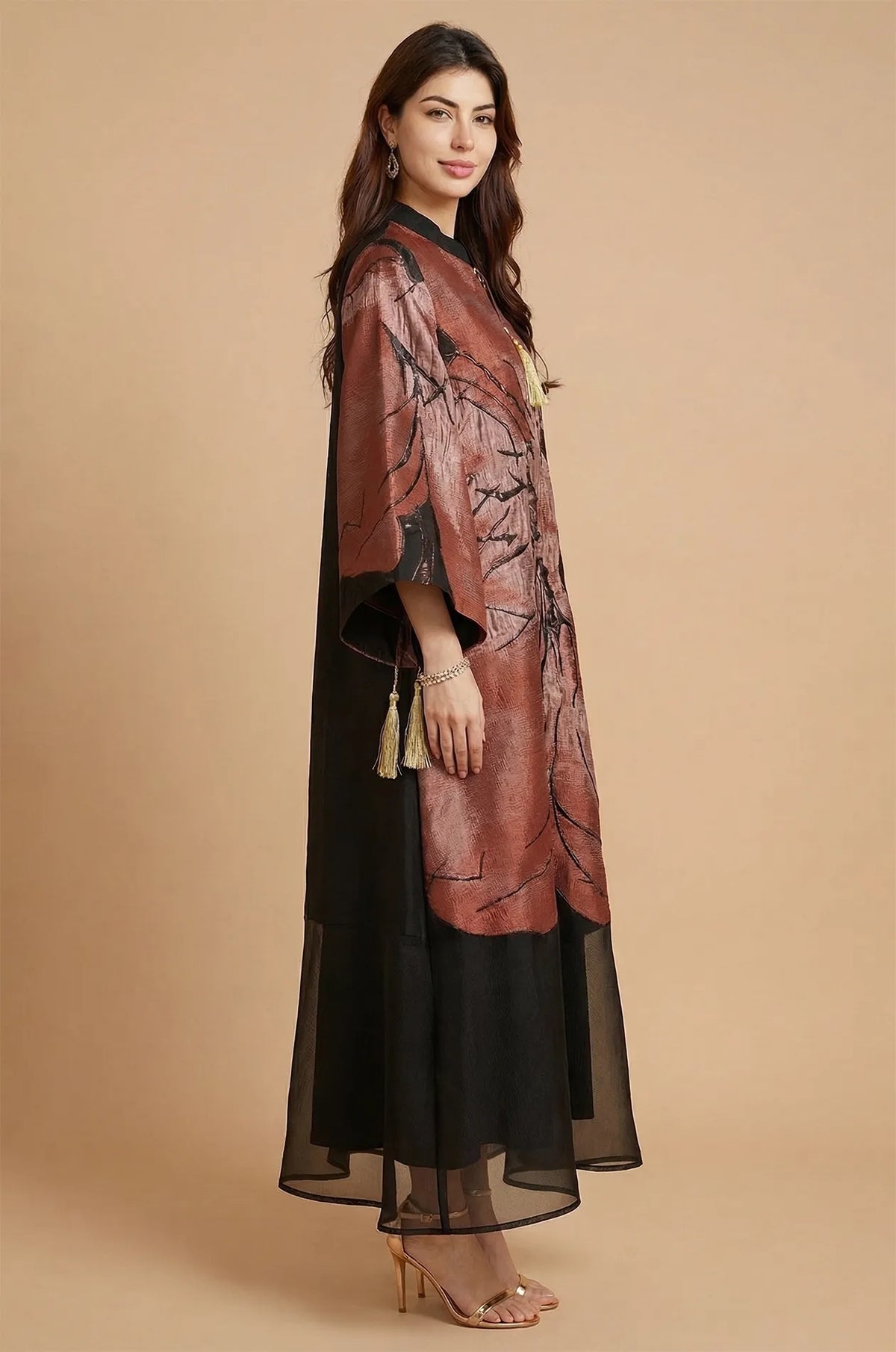 Side view of the Naeli Red flowy kaftan showcasing the elegant drape and wide butterfly sleeve design.