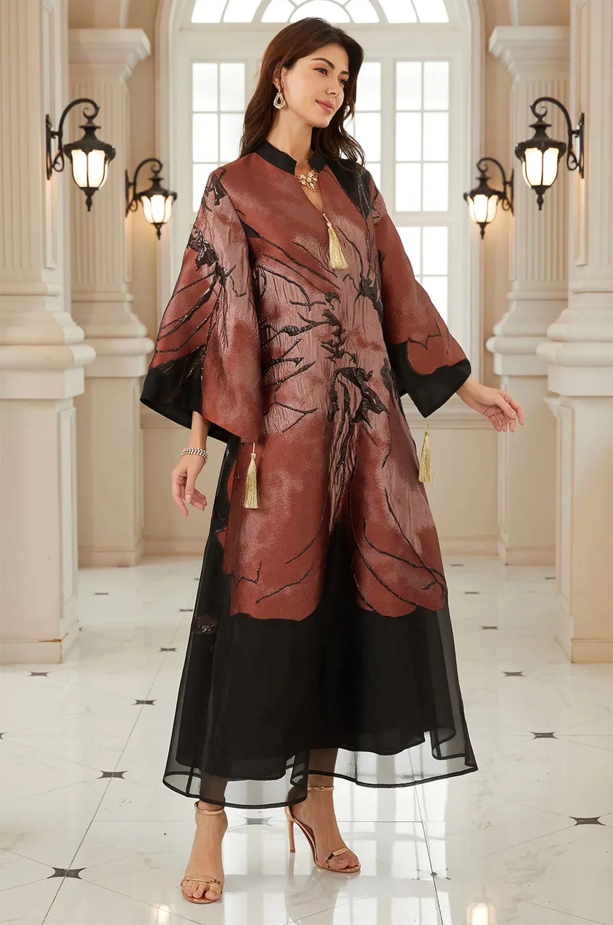 Three-quarter view of the Naeli Red flowy kaftan, an elegant formal gown with metallic floral accents.