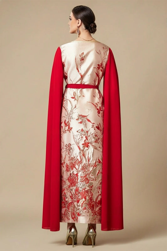 Back view of red and white kaftan dress with flowing red cape