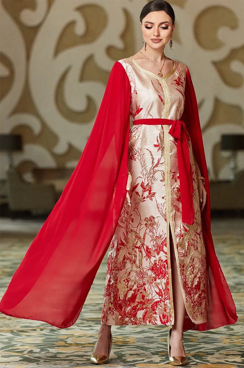 Fashion pose wearing red and white kaftan dress with cape drape