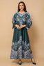 Front view of Narya emerald green gota patti kaftan with silver printed details and crystal neck work.