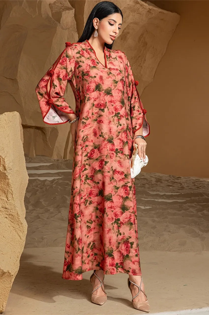 Fashion pose wearing Nayela red floral kaftan