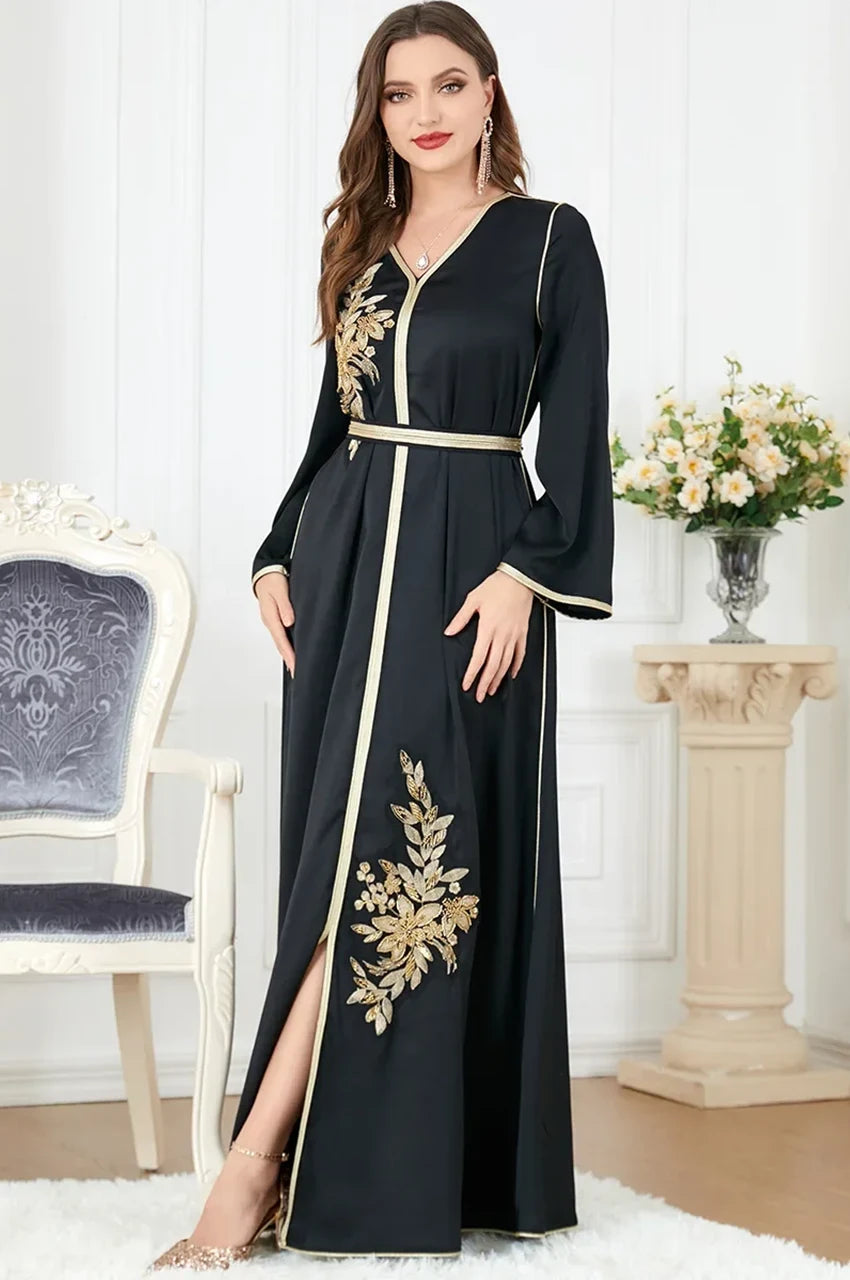 Elegant pose wearing Naylah black Moroccan kaftan