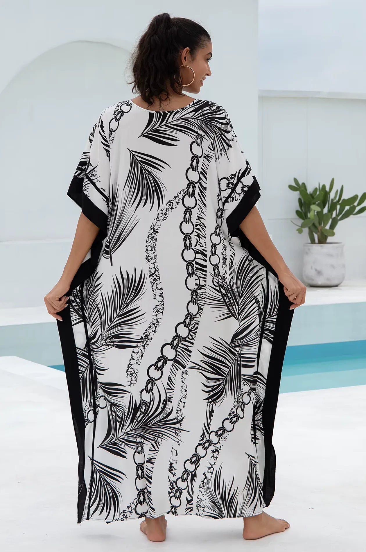 Naylara Adhara Palm Beach Kaftan White – Back View Outdoor Pool