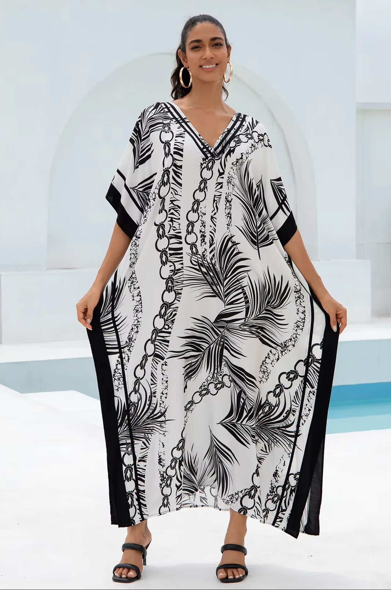 Naylara Adhara Palm Beach Kaftan White – Front View Outdoors Arms Open