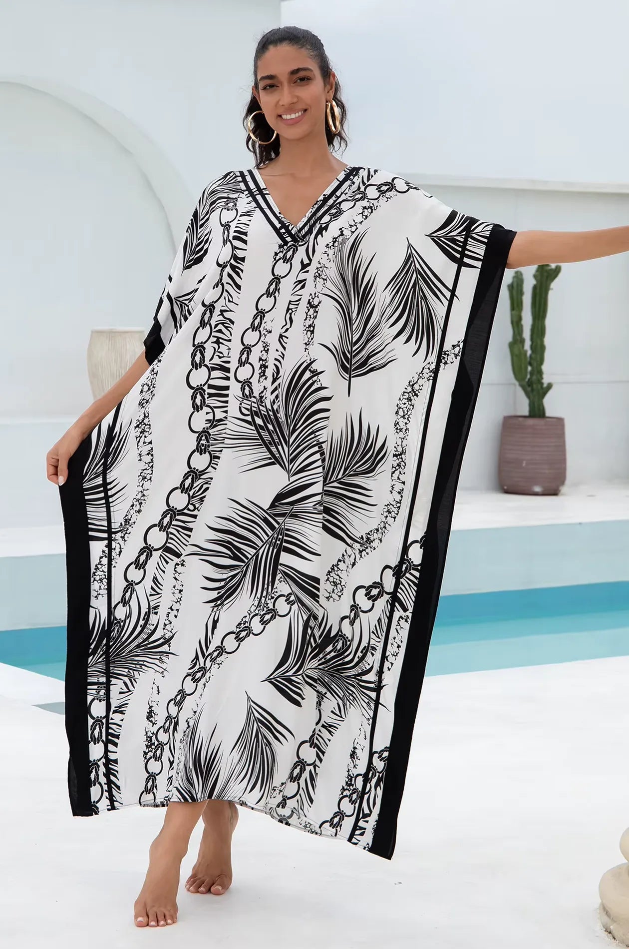 Naylara Adhara Palm Beach Kaftan White – Front View Walking by Pool
