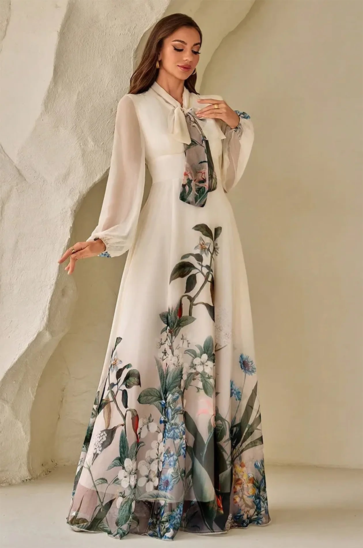 Close-up of the pussy-bow tie and sheer bodice of the Arina kaftan.
