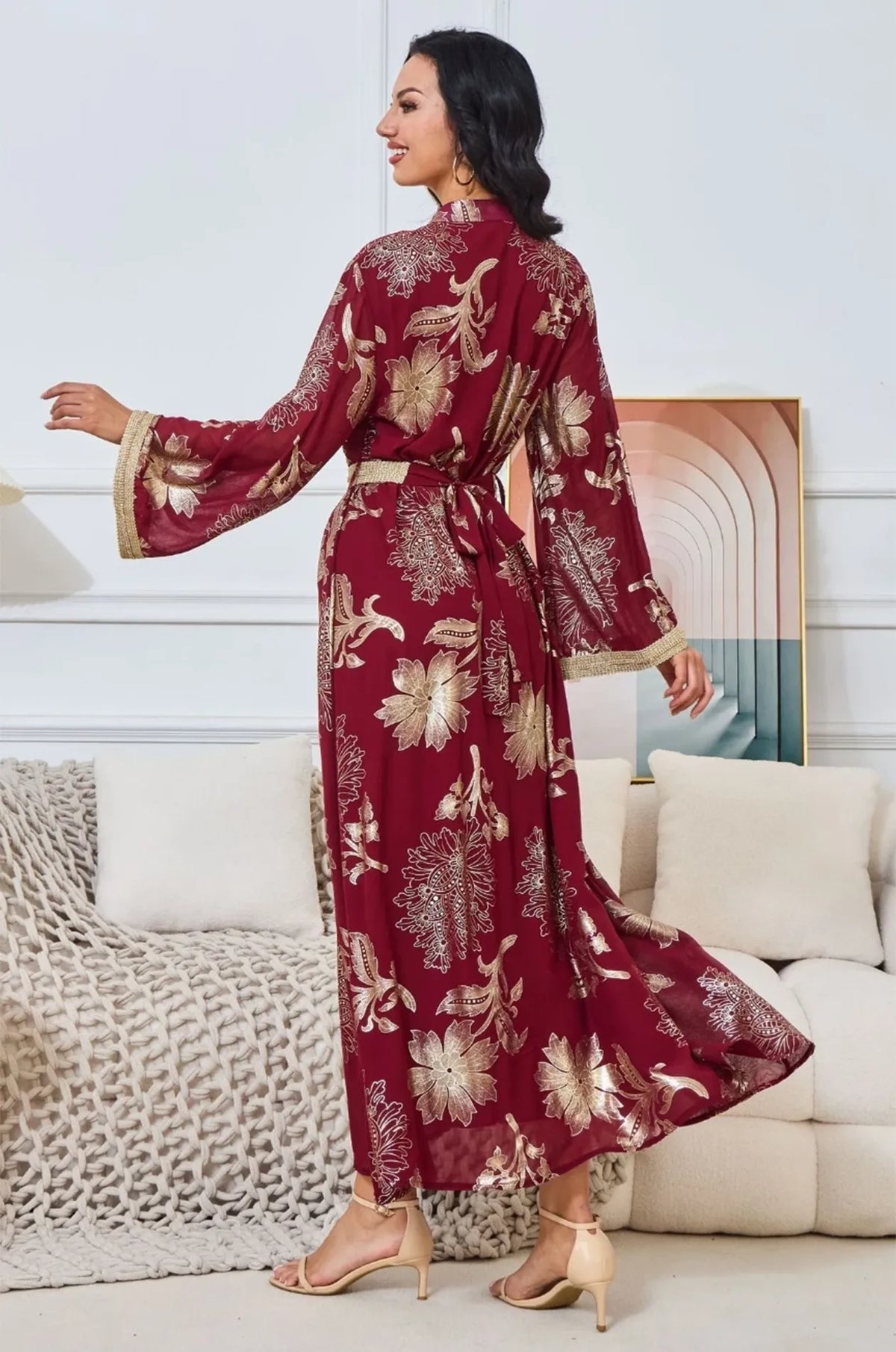 Rear view of the Ayrah kaftan showing movement and fabric texture.