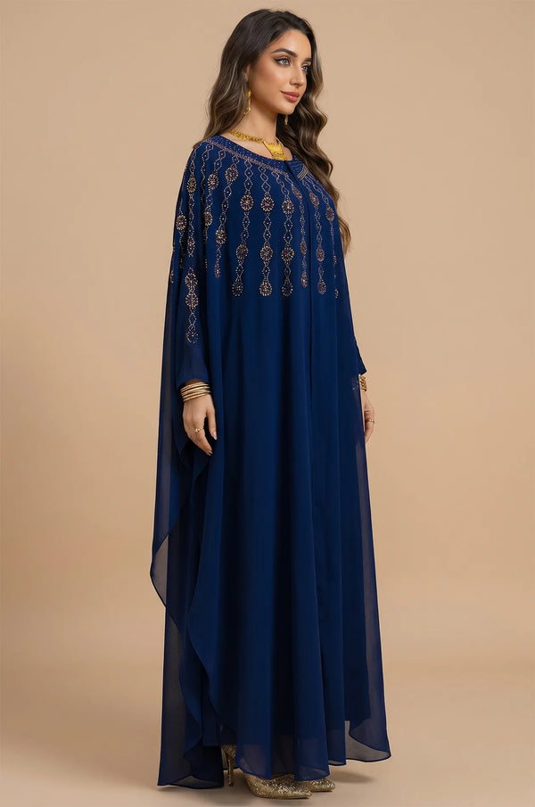 Three-quarter view of the Blue Cassia Rhinestone Kaftan illustrating the flowing chiffon layers.