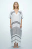 Naylara Dalia white and black striped maxi kaftan — front view with deep V-neck, studio shot