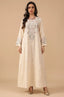 Full front view of the Naylara Equis modest kaftan in beige with floral embroidery and rhinestone details.