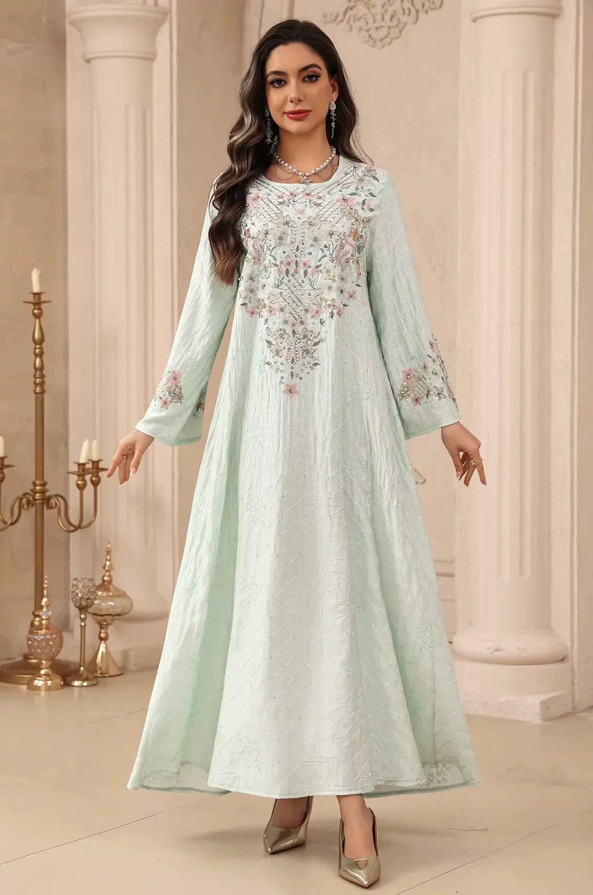 Elegant full-length shot of the light green Equis modest kaftan, ideal for formal occasions and weddings.