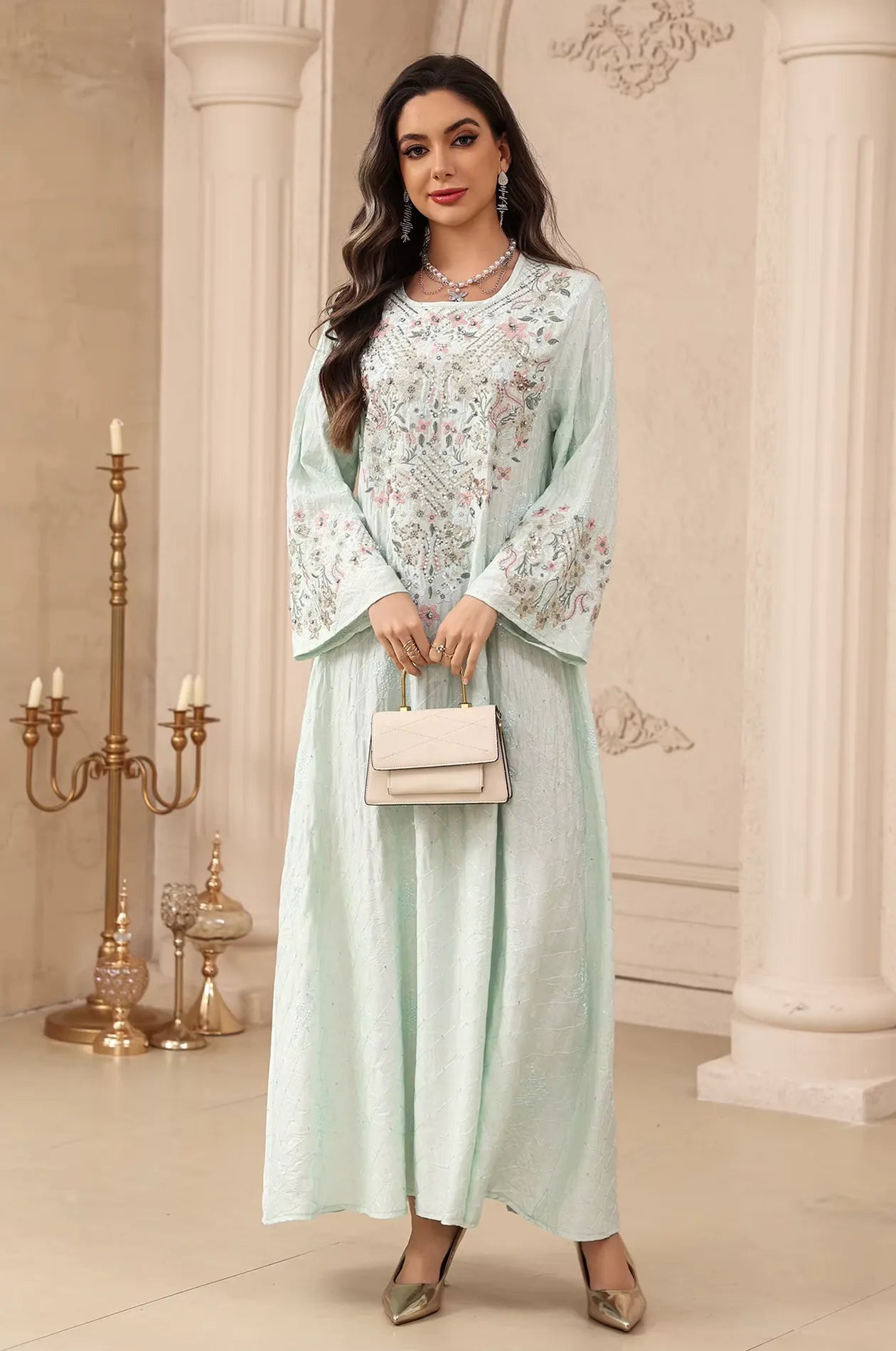 Elegant full-shot of the white Equis floral modest kaftan, perfect for weddings and formal celebrations.