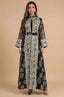 Studio front view of the Gienah black chic kaftan, showcasing the symmetrical embroidery and Mandarin collar design.