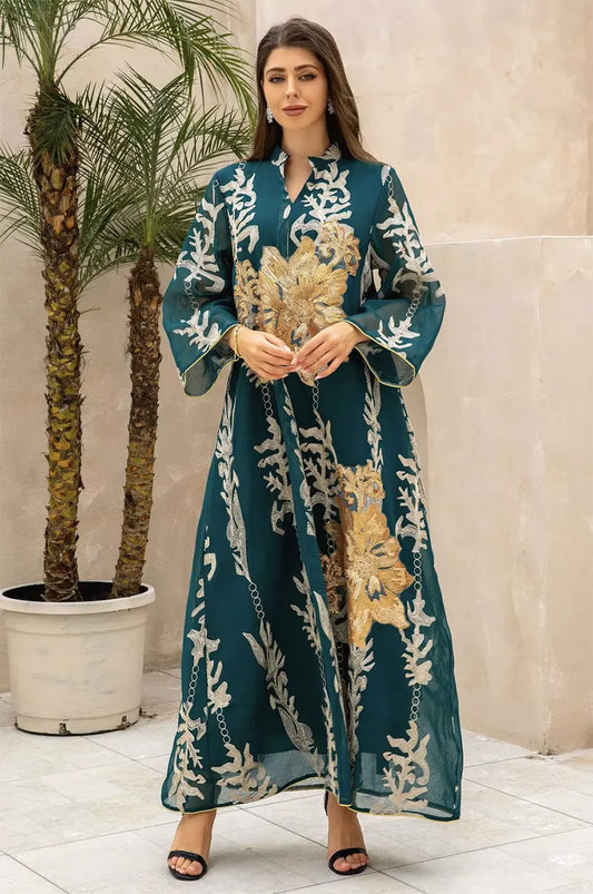 Elegant front view of the emerald green Maliya flower kaftan featuring bold gold floral appliqué and bell sleeves.