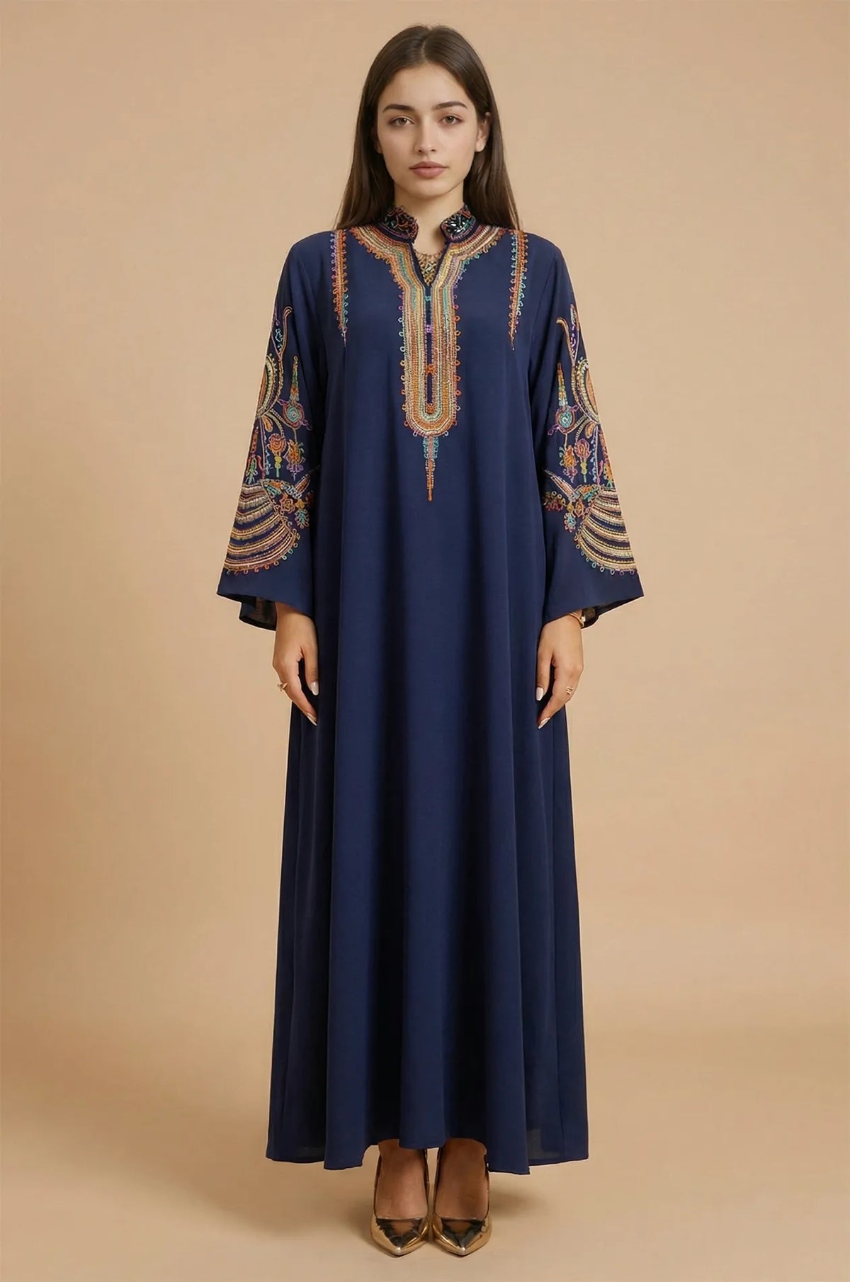 Full-length front view of the Naylara Inez Blue Jalabiya Kaftan featuring vibrant rainbow braided embroidery on the bodice.
