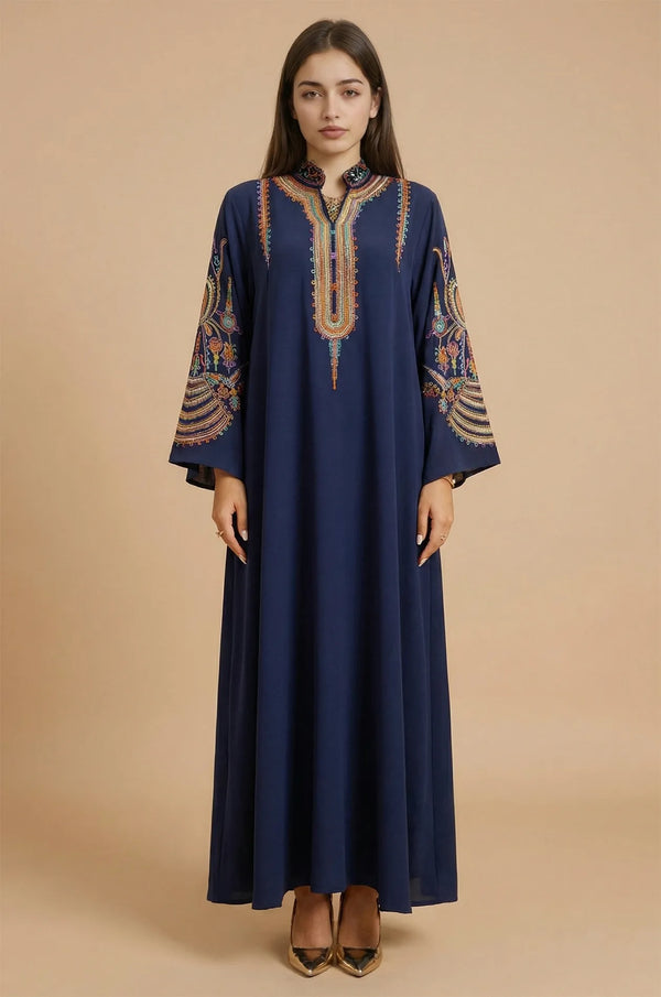 Full-length front view of the Naylara Inez Blue Jalabiya Kaftan featuring vibrant rainbow braided embroidery on the bodice.