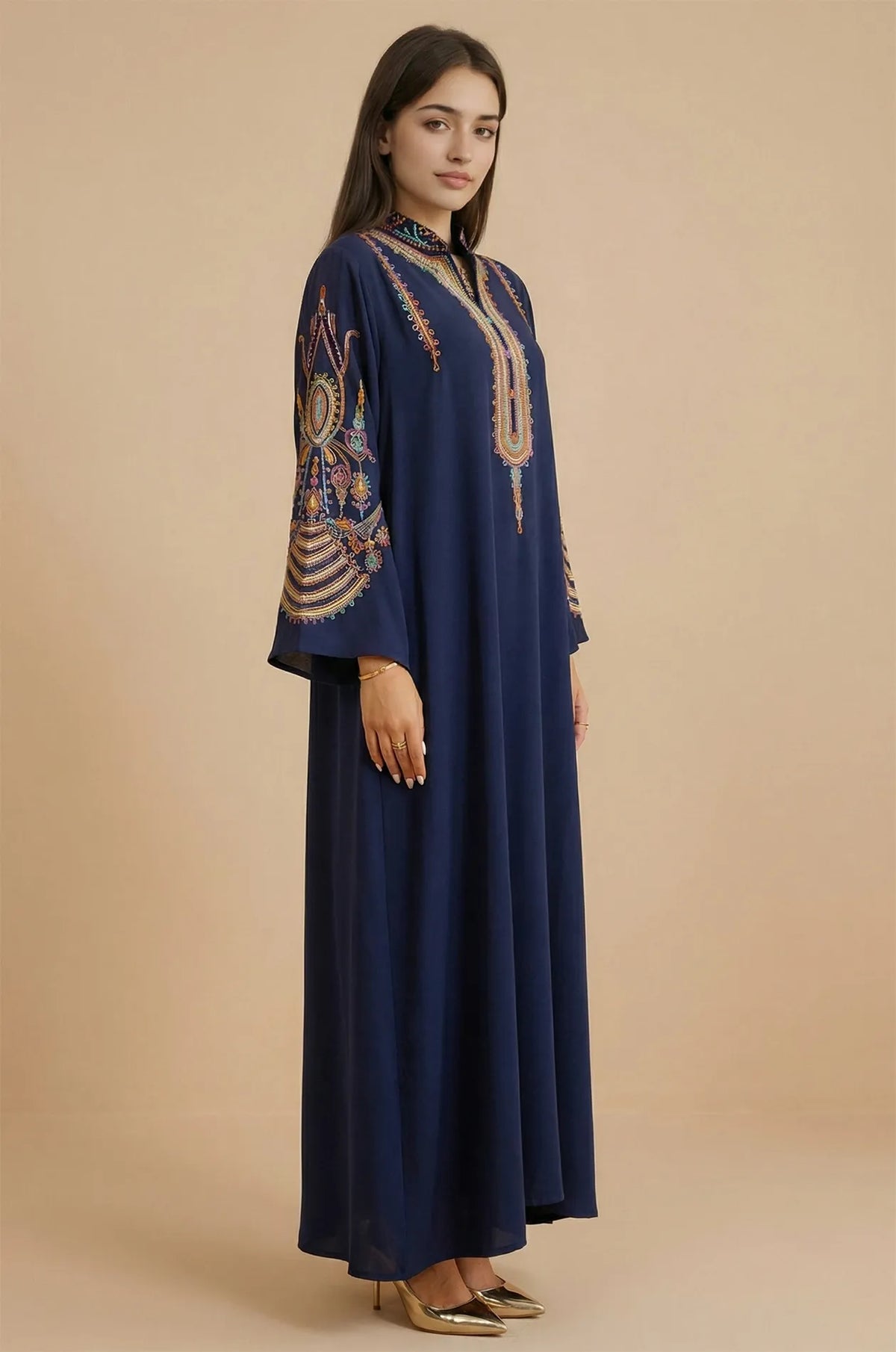 Side profile of the Inez Blue Jalabiya Kaftan showcasing the flowing fit and decorative sleeve embroidery.