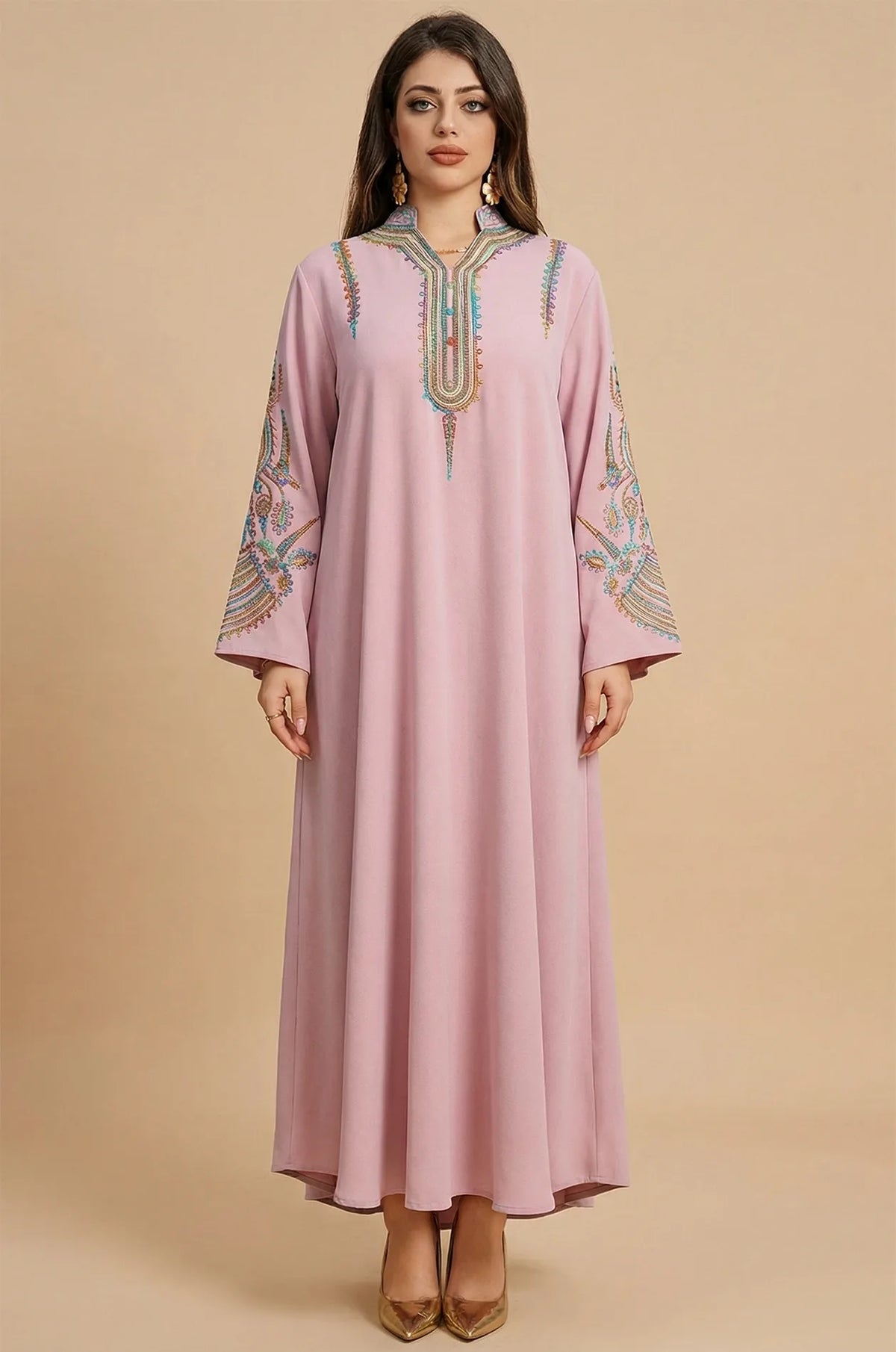 Studio front view of the Inez Pink Jalabiya Kaftan featuring traditional embroidery on a modest, floor-length gown.