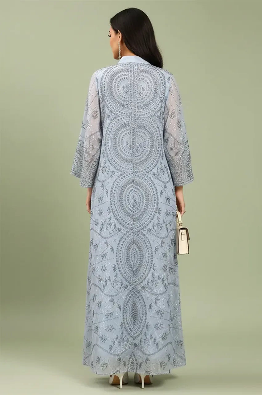 Rear view of the Kaly Light Blue sheer maxi kaftan highlighting the detailed Sfifa-inspired embroidery patterns on the back.