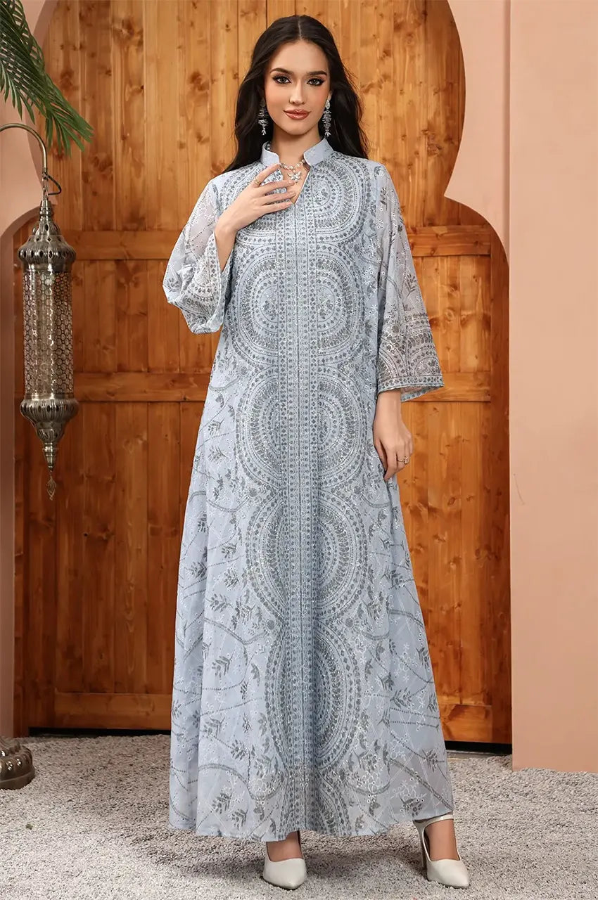 Elegant front pose of the Kaly Light Blue sheer maxi kaftan, an essential piece for modest chic wardrobes.