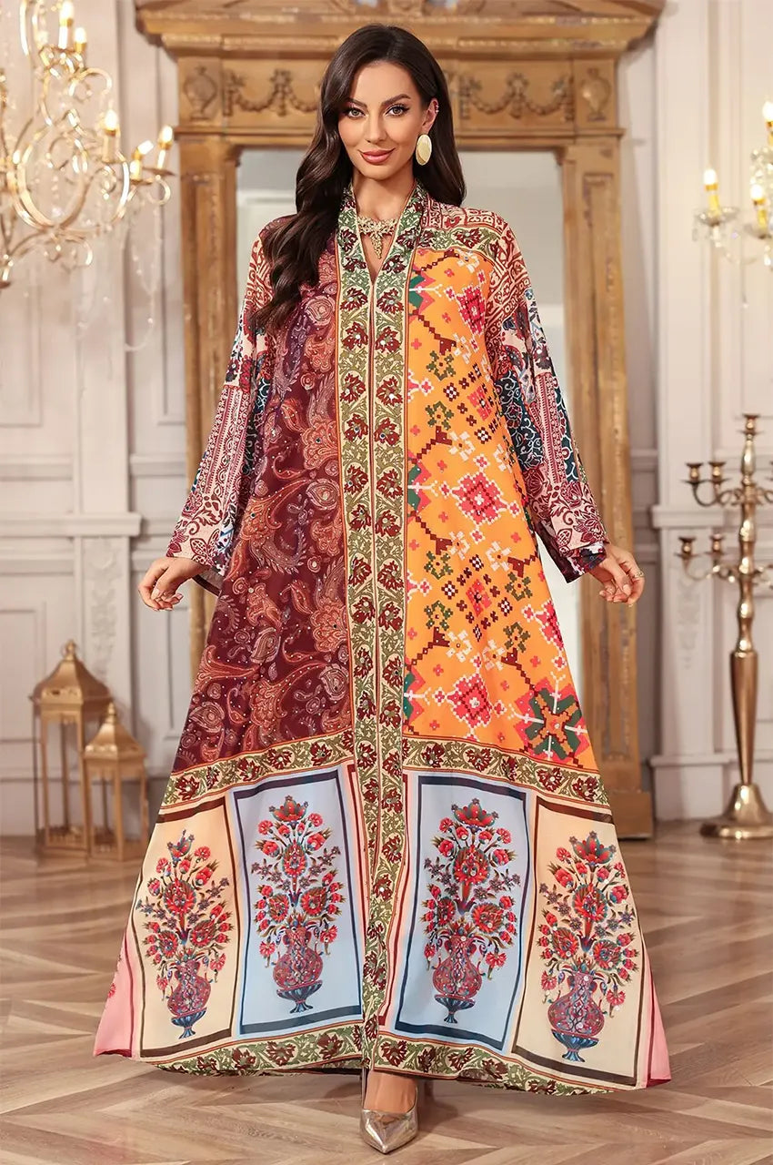 Full frontal pose of the Kimia red Indian kaftan night dress by Naylara, emphasizing the traditional vase motifs at the hem.