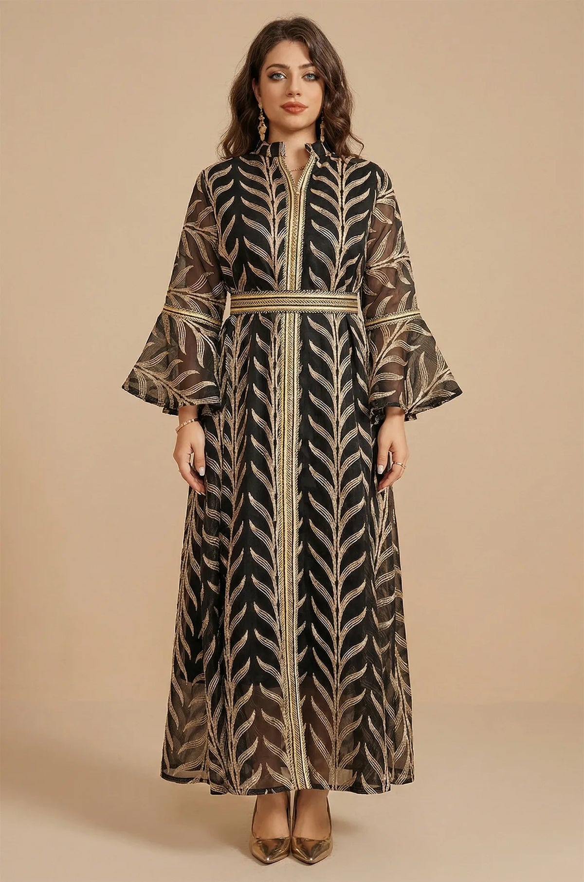 Full-length front view of the Kitala Elegant Moroccan Kaftan in black featuring metallic gold leaf embroidery and ruffled bell sleeves on a neutral background.