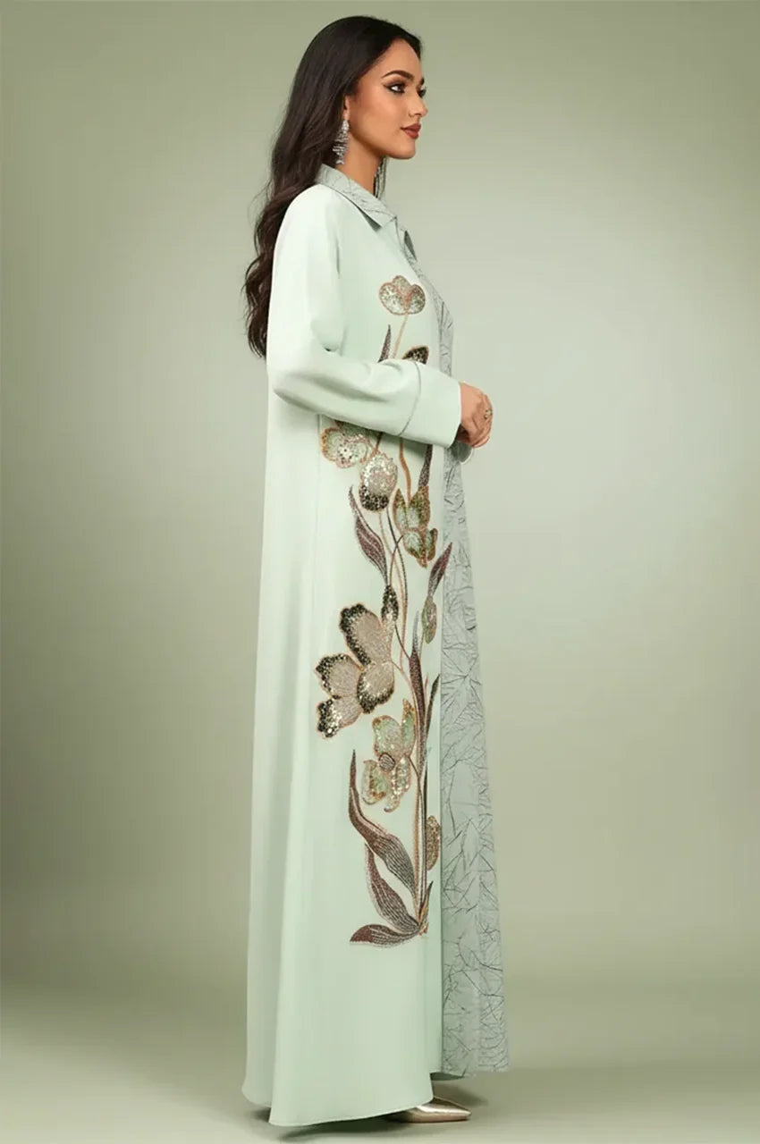 Rear view of the Lamiya Green a line kaftan dress illustrating the split-design aesthetic and fluid floor-skimming drape.