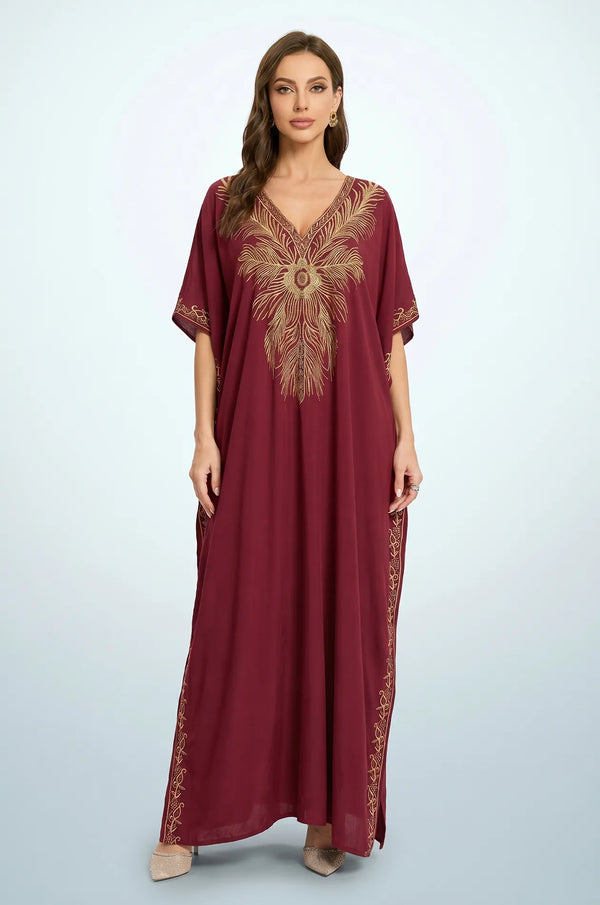 Naylara Laurel burgundy red kaftan gold feather embroidery — clean studio front shot full length