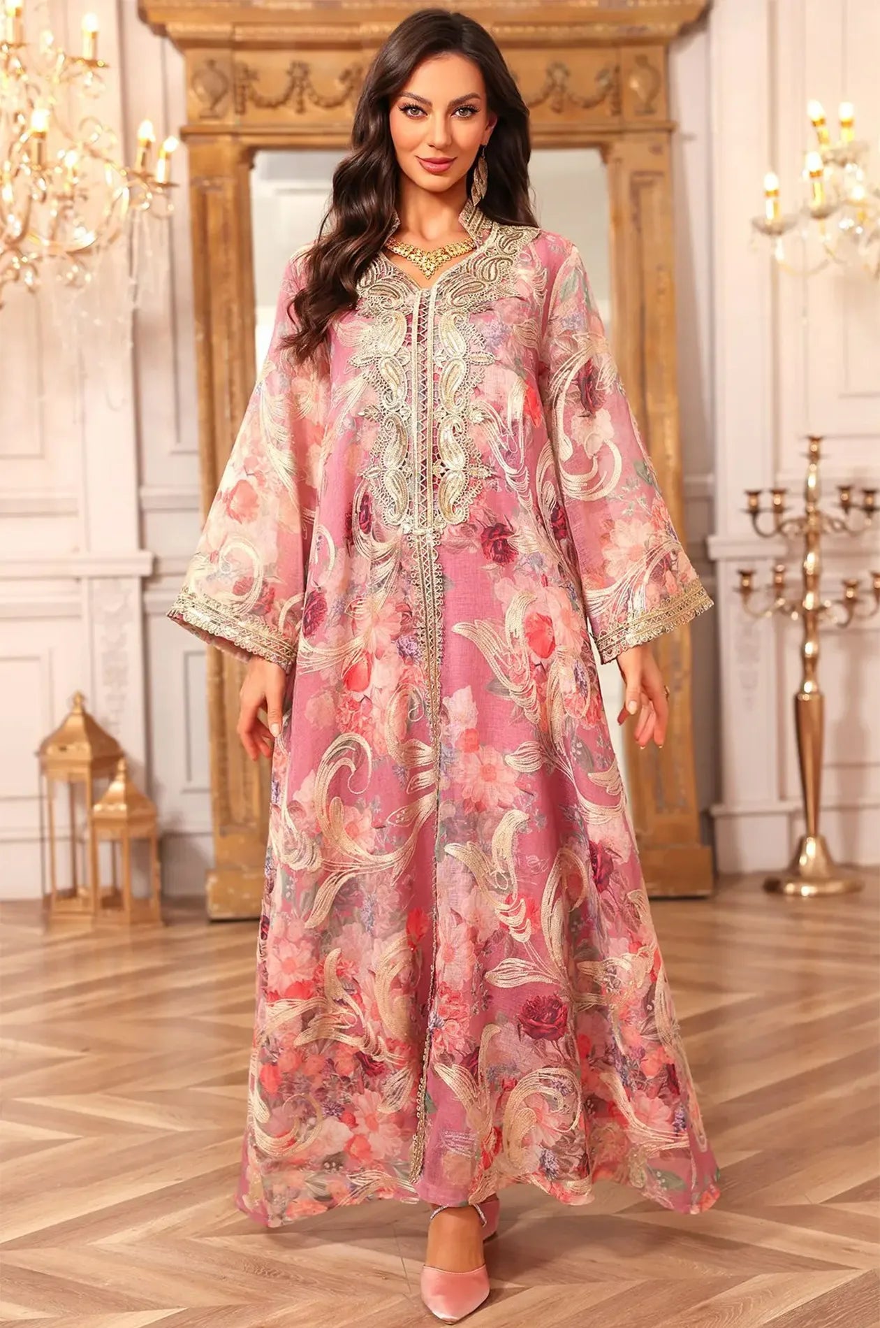 Full frontal shot of the Naylara Lyrae pink luxury party kaftan featuring ornate gold sfifa braiding and floral motifs.