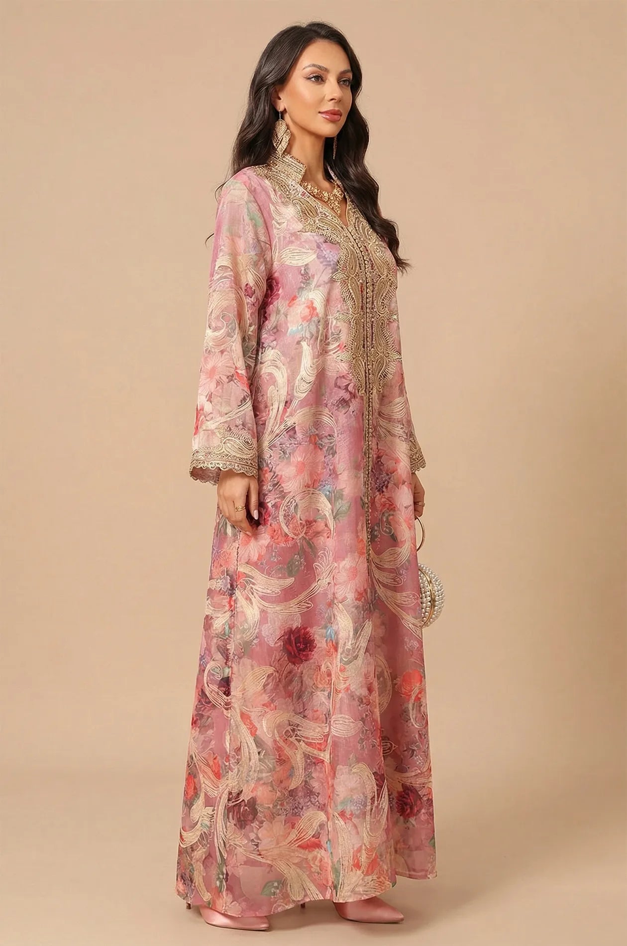 Side profile of the Naylara Lyrae pink vintage kaftan highlighting the elegant sleeve drape and gold embroidery details.