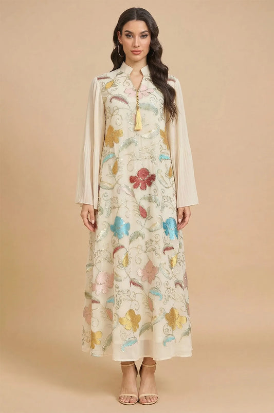 Professional studio full-length shot of the Marylin Beige Tassel Kaftan against a neutral background for product clarity.