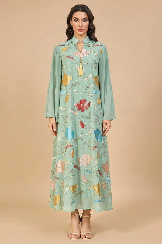 Full-length front view of the Marylin Green Tassel Kaftan by Naylara, featuring vibrant floral sequin embroidery and a gold tassel.