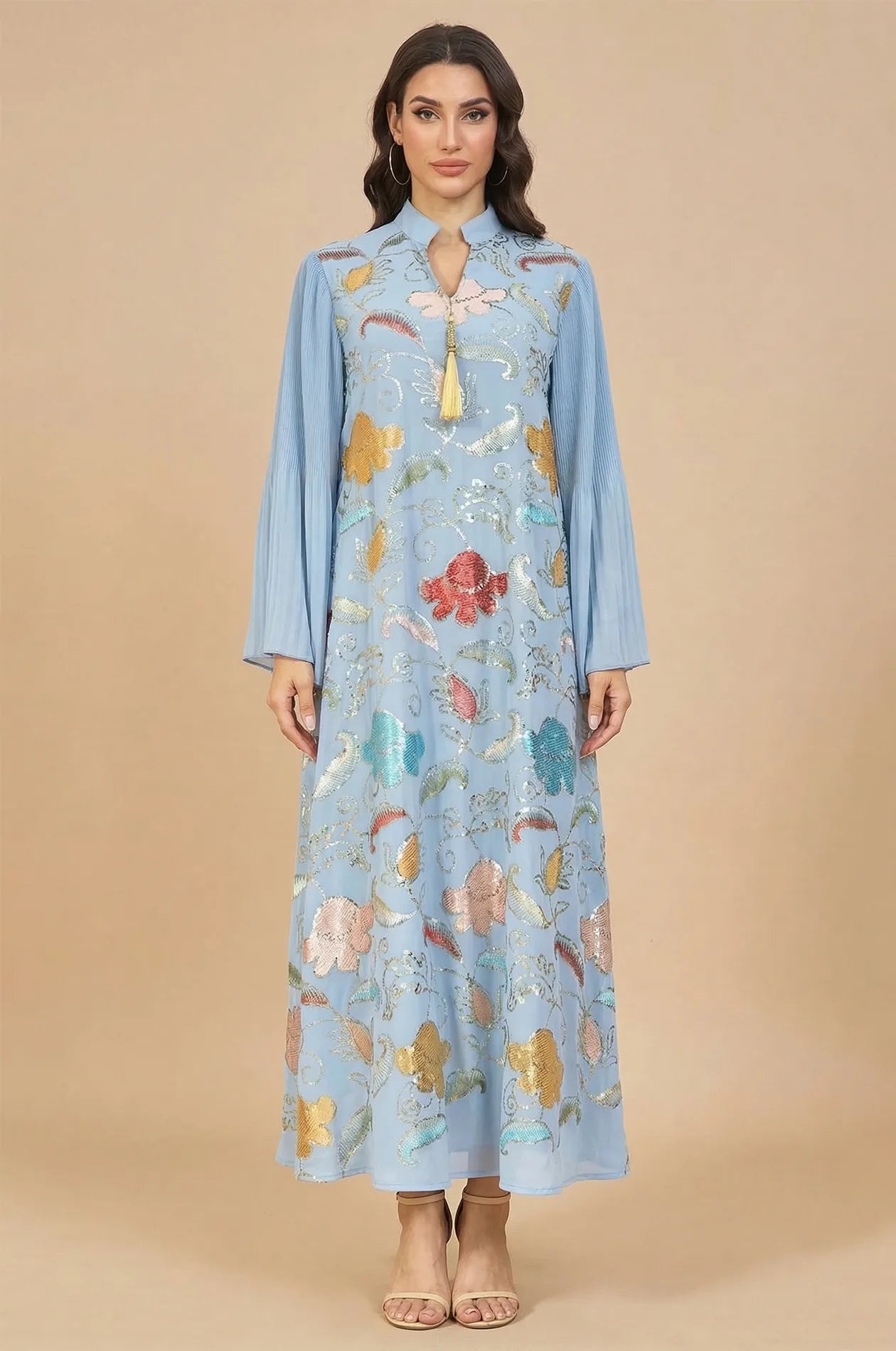 Full-length studio portrait of the Marylin Light Blue Tassel Kaftan, perfect for formal events or party wear.