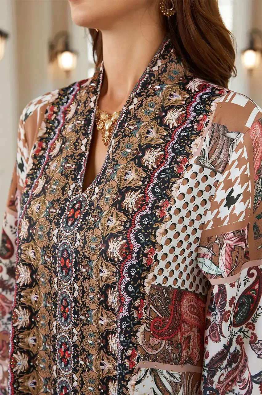Close-up of the crystal-embellished V-neck and block print texture on the Nalah kaftan.