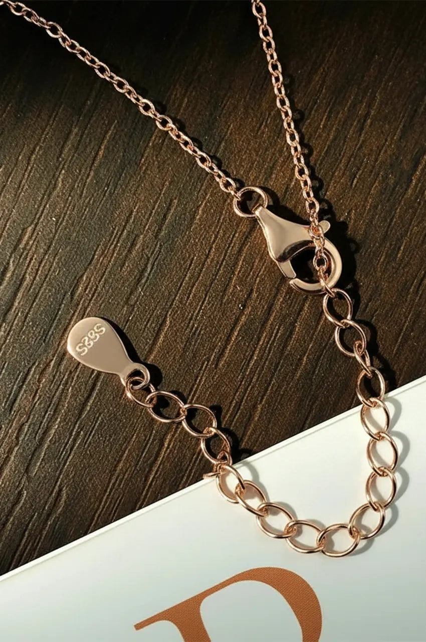Macro shot of S925 rose gold stamp on rose gold necklace clasp