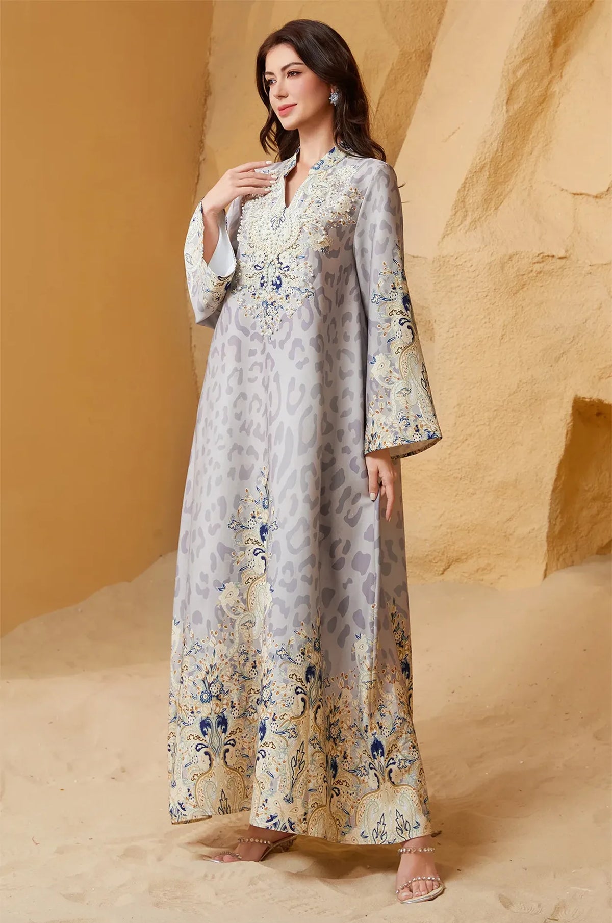 Elegant editorial pose of the Nyx Gray Leopard Print Kaftan, emphasizing its use as a sophisticated formal or party garment for luxury events.