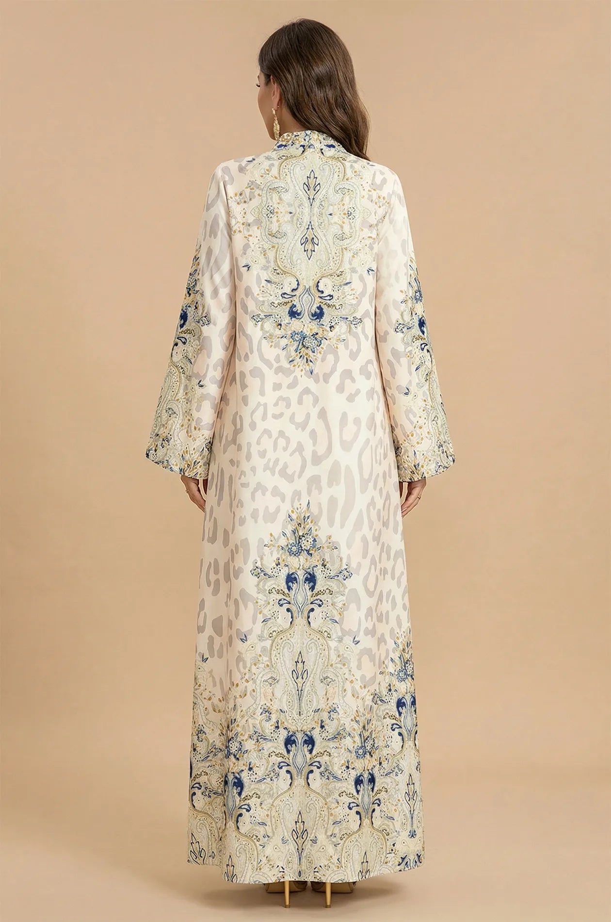 Back view of the Nyx White Animal Print Kaftan, showing the continuous decorative border and the elegant floor-length silhouette.