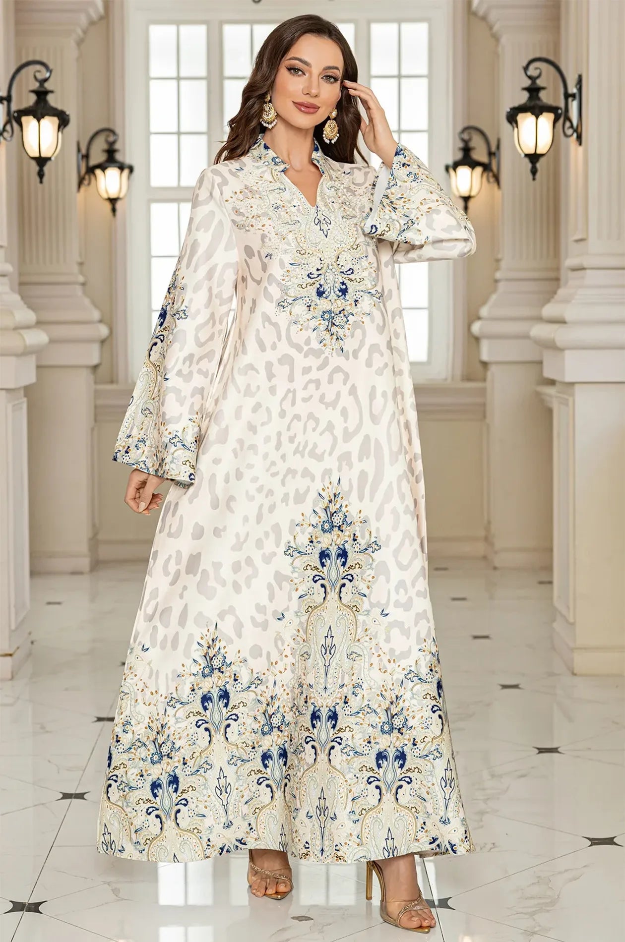 Fashion-focused view of the Nyx White Printed Kaftan, showcasing the sophisticated blend of contemporary animal print and traditional Moroccan-inspired motifs.