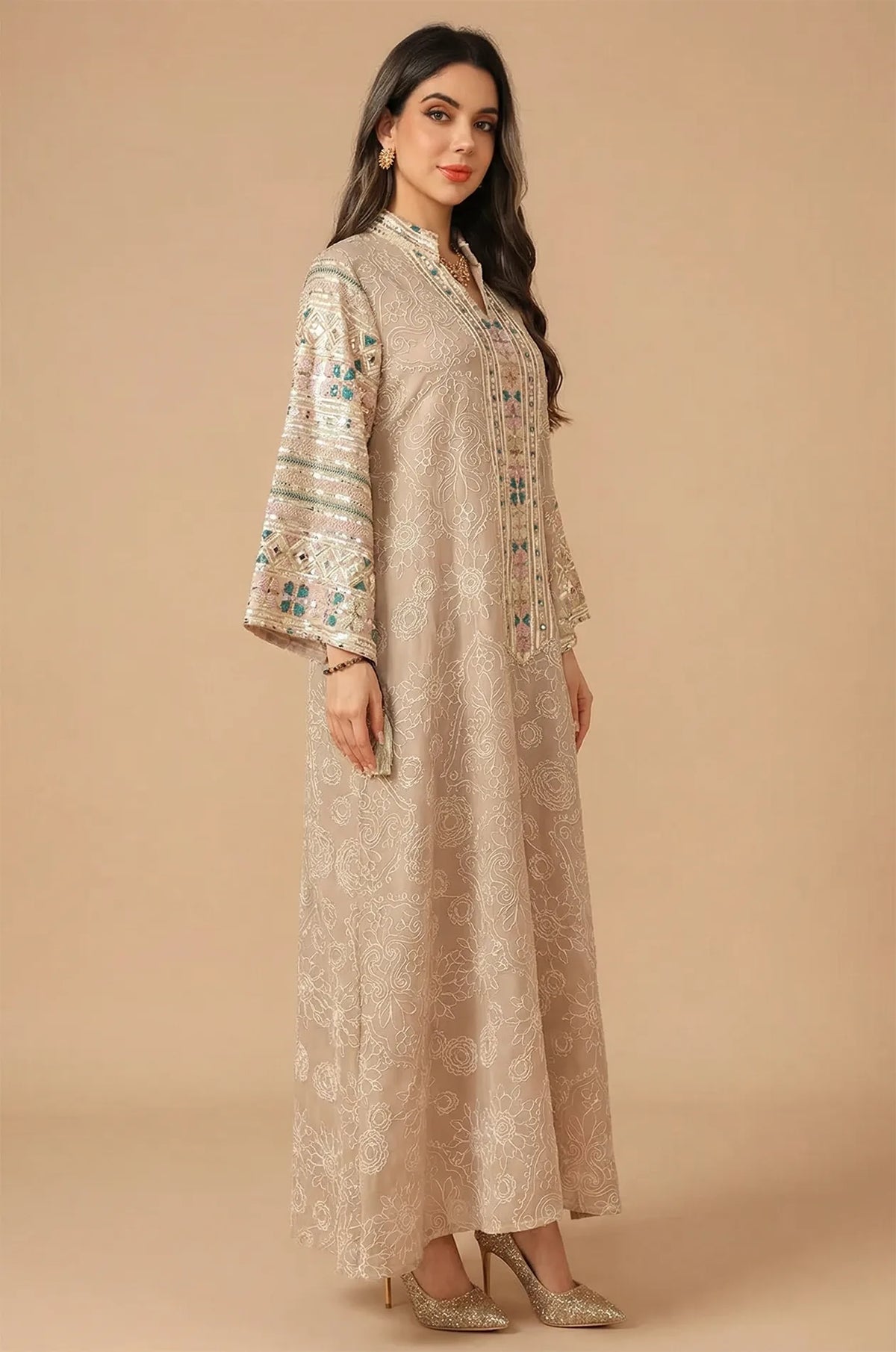 Side profile of the Naylara Orla apricot beige kaftan highlighting the dramatic bell sleeve volume.