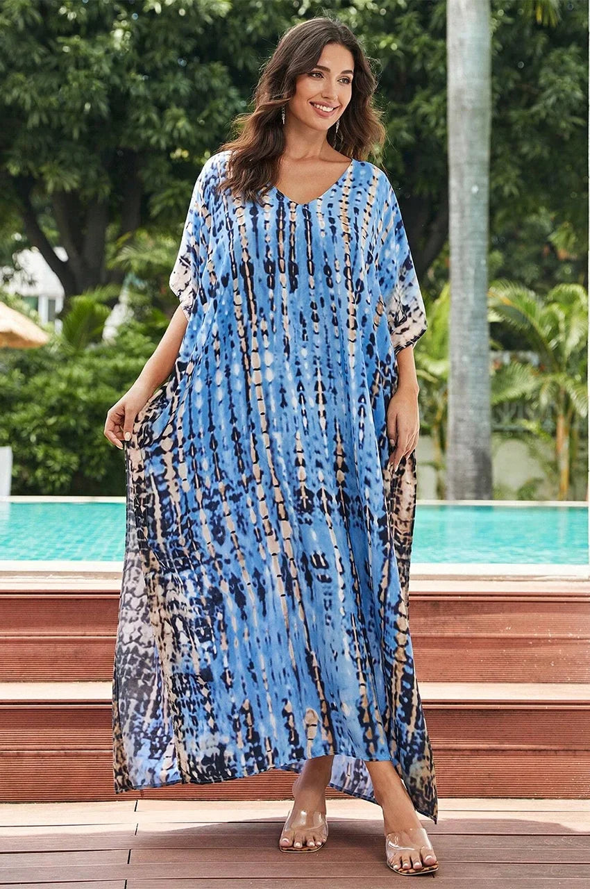 Sahra Sky Blue Tie Dye Kaftan close to a poolside in elegant wave pose
