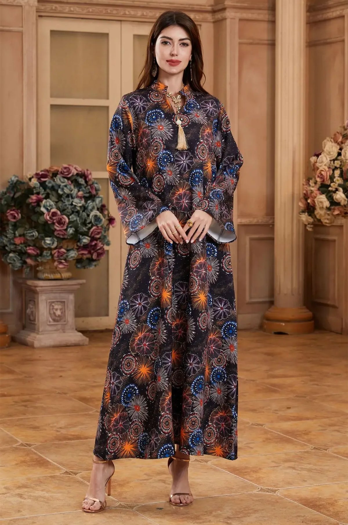 Model posing in the Samia celestial kaftan, showcasing a sophisticated evening look.
