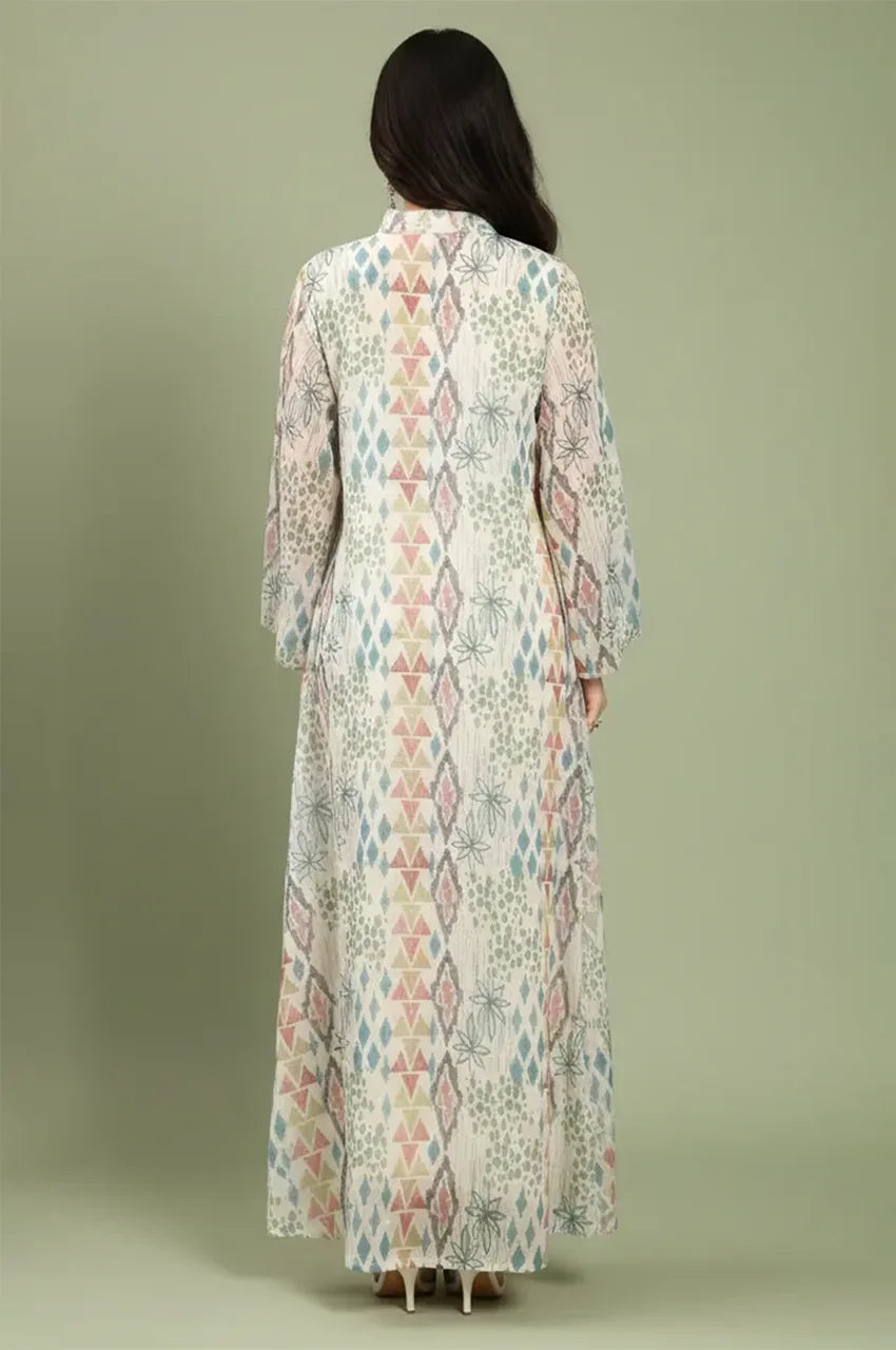 Rear view of the Tyrah white geometric print kaftan showcasing the symmetrical geometric patterns and ankle-length silhouette.