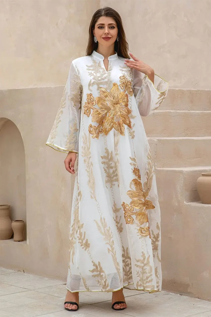 Front view of the Maliya flower kaftan in white with gold thread embroidery for luxury modest fashion.