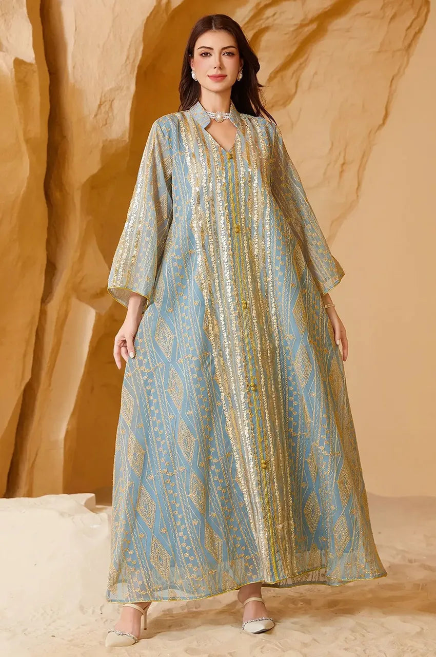 Full body shot of the Naylara Yara Kaftan in Pastel Green standing, showing the dress drape.
