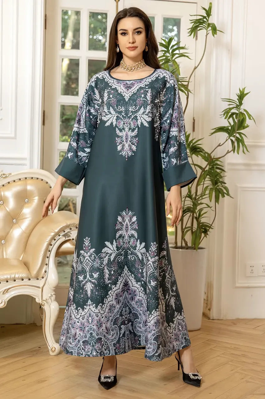 Full length standing pose of Nayra emerald gota patti kaftan showing A-line cut and sleeve width.