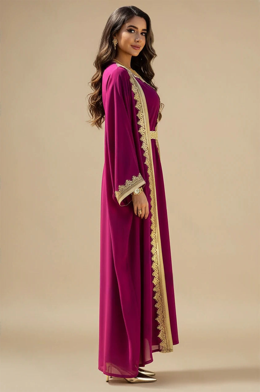 Side profile of the NAYRA long sheer kaftan in hot pink highlighting the wide sleeves.