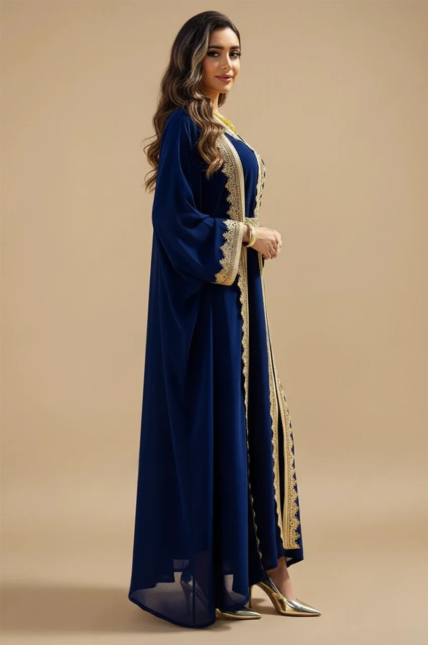 Side profile of the NAYRA long sheer kaftan set in royal blue.