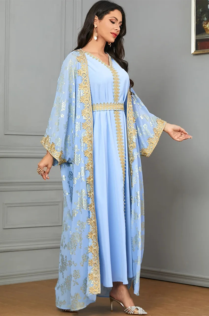 Side view of Nehya 2-piece light blue floral print kaftan dress showing cape sleeves.