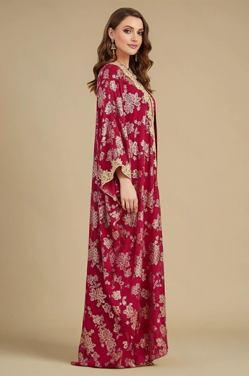 Side view of the Nehya 2-piece red floral print kaftan dress with wide cape sleeves.